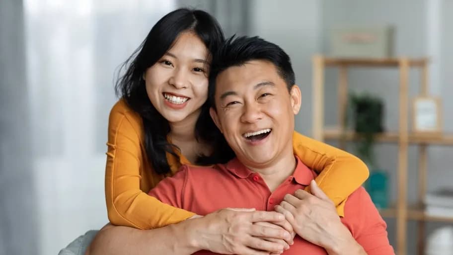 Happy couple feeling hopeful after learning about IVF options.